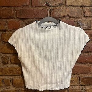 Cute White Textured Top with Navy Lettuce Trim